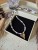AMALI Naszyjnik z koralików fimo i hematytu ze złotym sercem | Brązowy