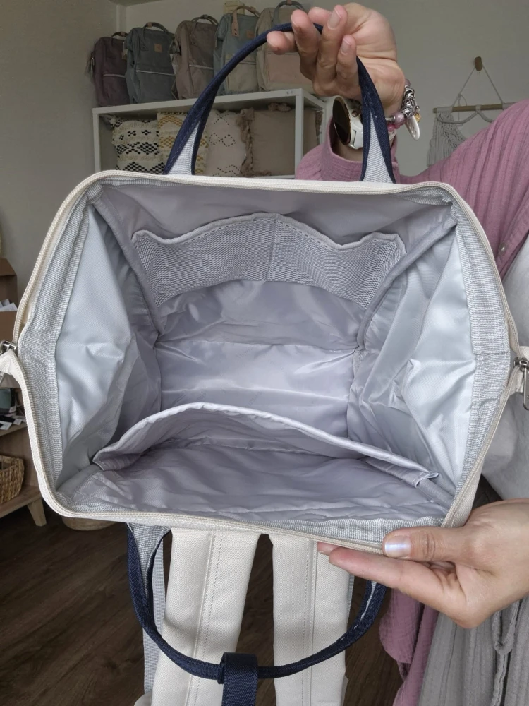 Wodoodporny plecak miejski unisex z uchwytem na walizkę - na podróż, do pracy, na wycieczkę, na uczelnię i do szkoły/ Kolor miętowo-granatowo-beżowo-brązowy