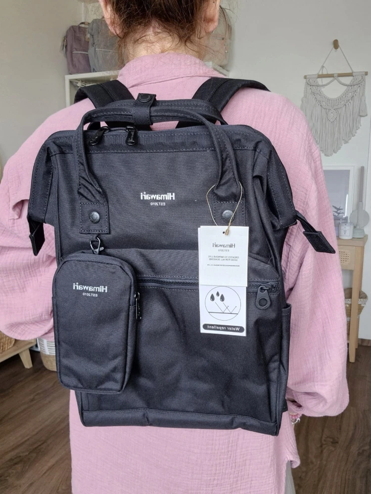 Wodoodporny plecak miejski unisex z uchwytem na walizkę - na podróż, do pracy, na wycieczkę, na uczelnię i do szkoły/ Kolor czarny