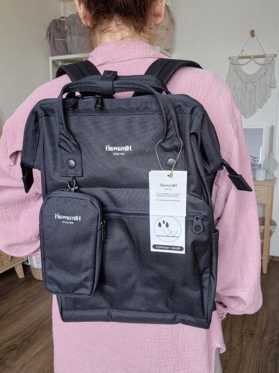Wodoodporny plecak miejski unisex z uchwytem na walizkę - na podróż, do pracy, na wycieczkę, na uczelnię i do szkoły/ Kolor czarny