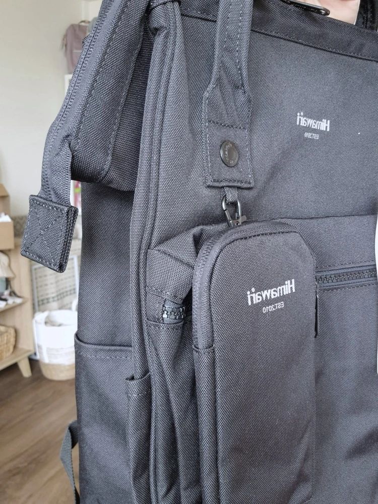 Wodoodporny plecak miejski unisex z uchwytem na walizkę - na podróż, do pracy, na wycieczkę, na uczelnię i do szkoły/ Kolor czarny