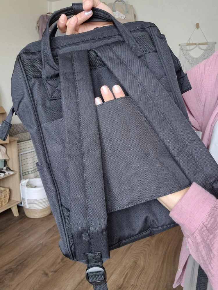 Wodoodporny plecak miejski unisex z uchwytem na walizkę - na podróż, do pracy, na wycieczkę, na uczelnię i do szkoły/ Kolor czarny