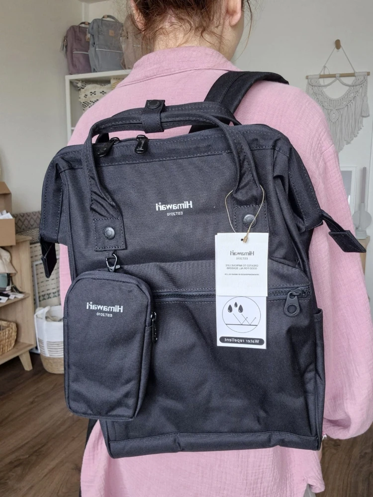Wodoodporny plecak miejski unisex z uchwytem na walizkę - na podróż, do pracy, na wycieczkę, na uczelnię i do szkoły/ Kolor czarny