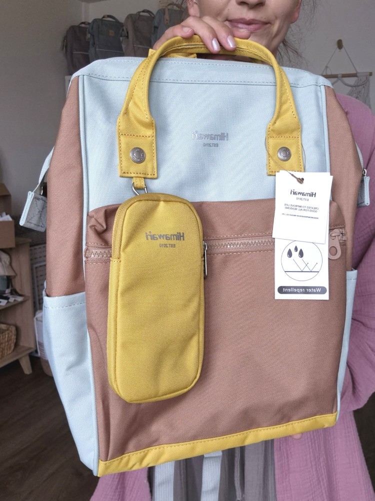 Wodoodporny plecak miejski unisex z uchwytem na walizkę - na podróż, do pracy, na wycieczkę, na uczelnię i do szkoły/ Kolor miętowo-żółto-brązowy