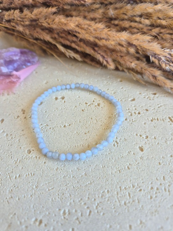Bransoletka zodiakalna BLIŹNIĘTA chalcedon kule 4mm na gumce – harmonia i komunikacja