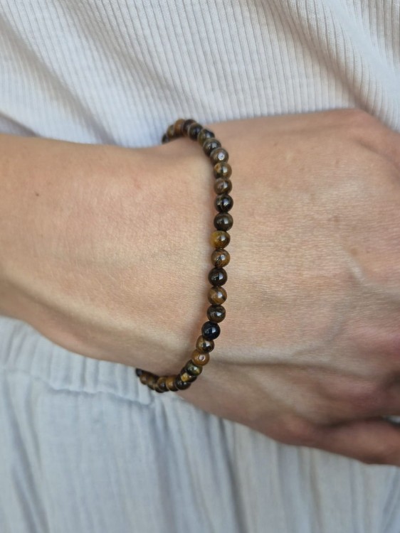 Bransoletka zodiakalna LEW tygrysie oko kule 4,5mm na gumce - odwaga i pewność siebie