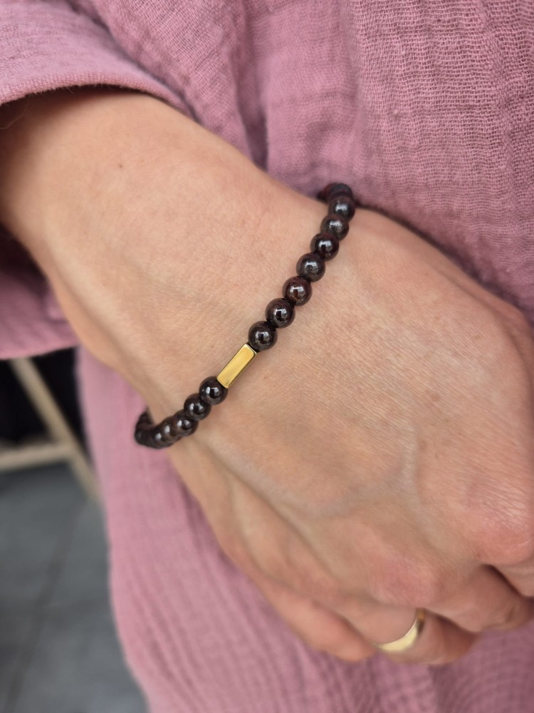 Bransoletka zodiakalna KOZIOROŻEC granat i hematyt kule 6,5mm na gumce - energia i pewność siebie